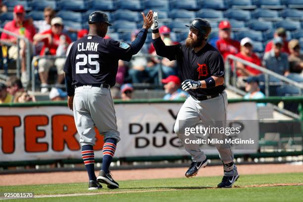 Derek Norris of the Detroit Tigers runs the bases after hitting a three run homer during the third inning of the Spring Training game against the...