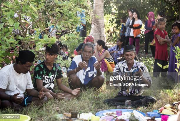 Bajau Imam reads from the Koran during a water festival held annually by the inhabitants of kalapuan Island. The festival is a purification ritual...