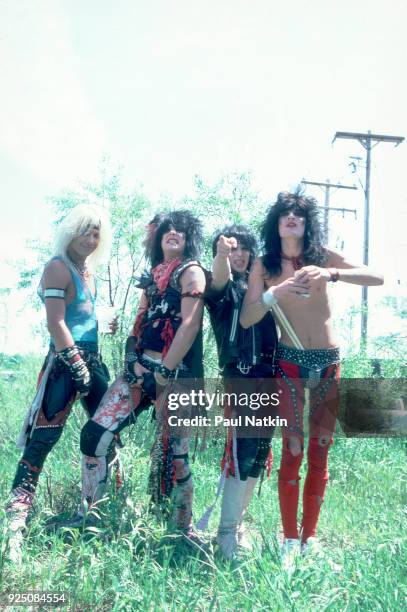 Portrait of Motley Crue, left to right, Vince Neil, Nikki Sixx, Mick Mars, and Tommy Lee, at a Rock Festival outside of Kalamazoo, Michigan, October...