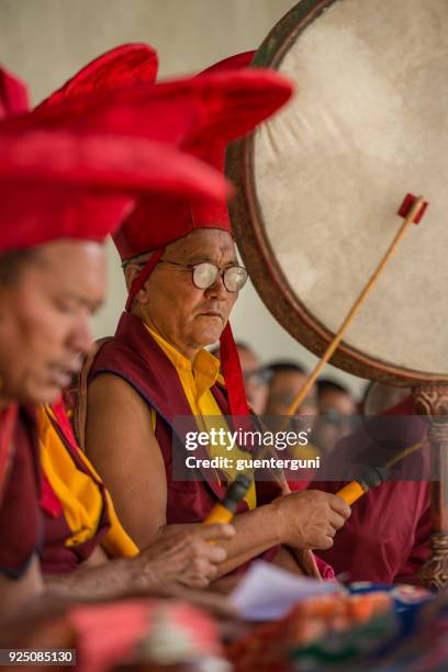 buddhist lamas (head monks) making music during festival - musican imagens e fotografias de stock