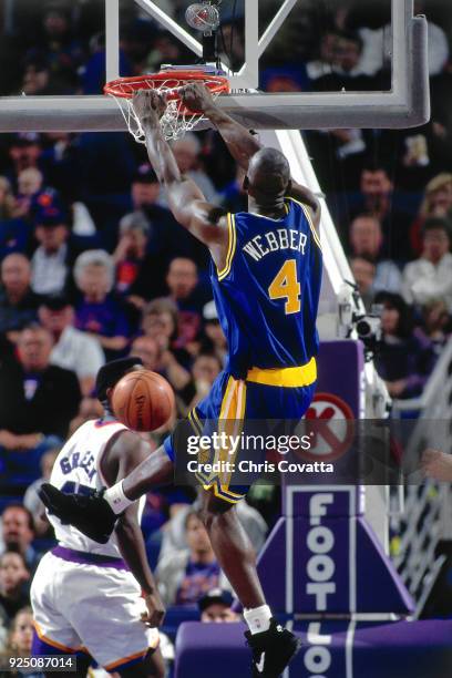 Chris Webber of the Golden State Warriors dunks during a game on January 9, 1994 at America West Arena in Phoenix, Arizona. NOTE TO USER: User...