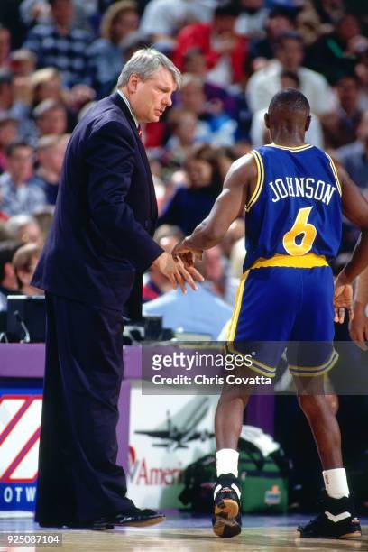 Don Nelson and Avery Johnson of the Golden State Warriors talk during a game on January 9, 1994 at America West Arena in Phoenix, Arizona. NOTE TO...