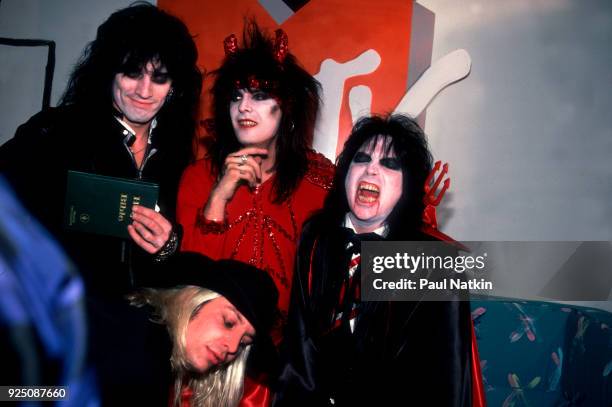 Portrait of glam metal band Motley Crue at a MTV Halloween Party at the Limelight in Chicago, Illinois, October 31, 1985. Left to right, Tommy Lee,...