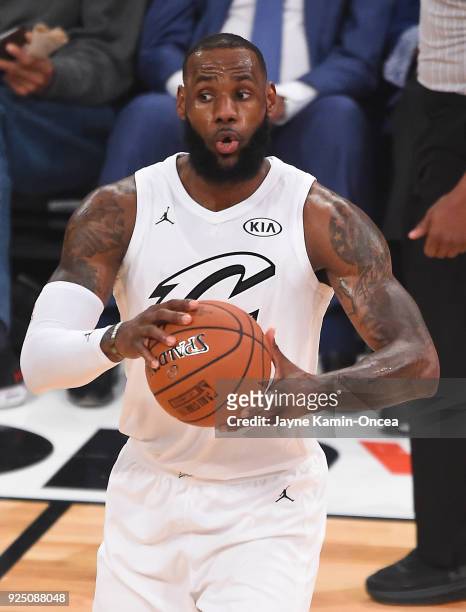 LeBron James of Team LeBron looks to pass the ball during the fourth quarter of NBA All-Star Game 2018 at Staples Center on February 18, 2018 in Los...