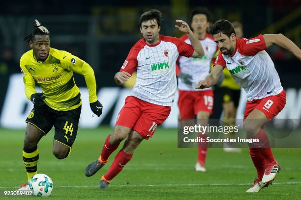 Michy Batshuayi of Borussia Dortmund , Jan Moravek of FC Augsburg , Rani Khedira of FC Augsburg during the German Bundesliga match between Borussia...