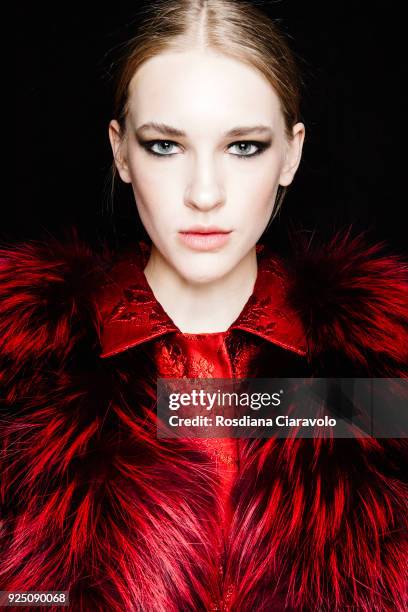 Model is seen backstage ahead of the Piccione.Piccione show during Milan Fashion Week Fall/Winter 2018/19 on February 25, 2018 in Milan, Italy.