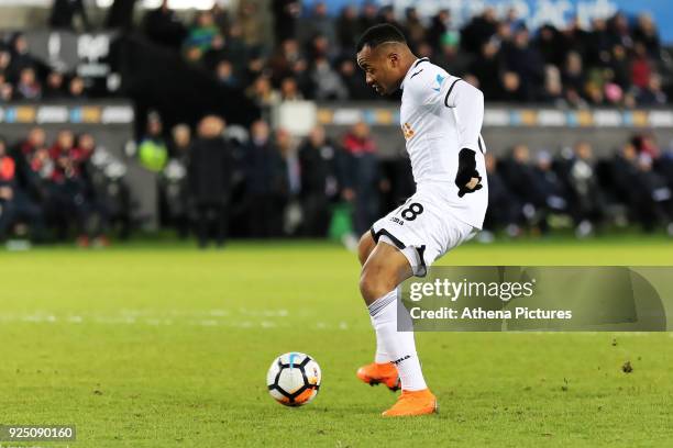 Jordan Ayew of Swansea City scores the opening goal during The Emirates FA Cup Fifth Round Replay match between Swansea City and Sheffield Wednesday...