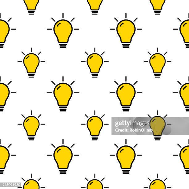 yellow light bulbs seamless pattern - yellow light effect stock illustrations