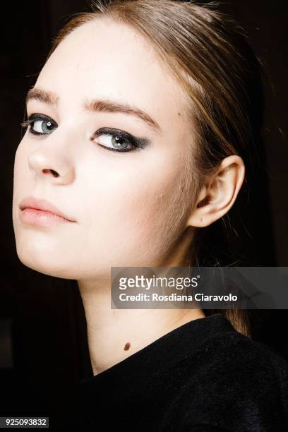 Model is seen backstage ahead of the Piccione.Piccione show during Milan Fashion Week Fall/Winter 2018/19 on February 25, 2018 in Milan, Italy.