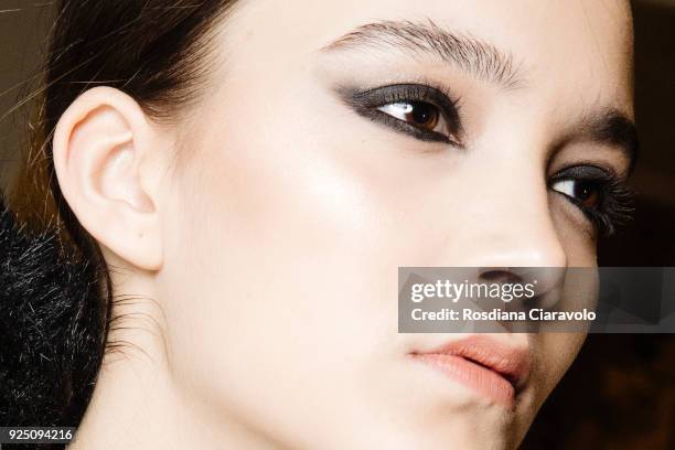 Model is seen backstage ahead of the Piccione.Piccione show during Milan Fashion Week Fall/Winter 2018/19 on February 25, 2018 in Milan, Italy.