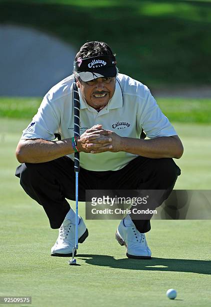 Eduardo Romero lines up an eagle putt on during the first round of the Charles Schwab Cup Championship at Sonoma Golf Club on October 29, 2009 in...