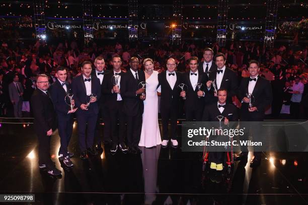 The Laureus Award winners with Prince Albert II of Monaco and his wife Charlene,Princess of Monaco pose on stage during the 2018 Laureus World Sports...