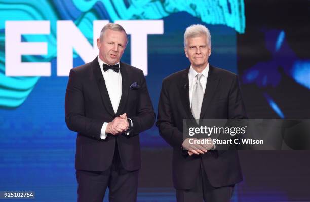 Laureus Academy Chairman Sean Fitzpatrick and Laureus Academy member Mark Spitz speak on stage during the 2018 Laureus World Sports Awards show at...