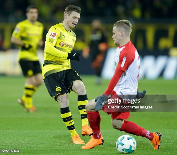 Lukasz Piszczek of Borussia Dortmund , Philipp Max of FC Augsburg during the German Bundesliga match between Borussia Dortmund v FC Augsburg at the...