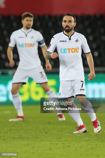 Leon Britton of Swansea City in action during The Emirates FA Cup Fifth Round Replay match between Swansea City and Sheffield Wednesday at the...