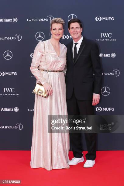 Laureus Academy member Maria Hoefl-Riesch and her husband Marcus Hoefl attend the 2018 Laureus World Sports Awards at Salle des Etoiles, Sporting...