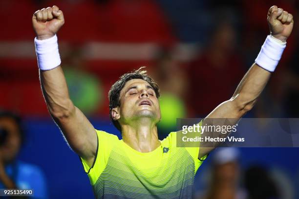 David Ferrer of Spain celebrates after winning the match against Andrey Rublev of Russia as part of the Telcel Mexican Open 2018 at Mextenis Stadium...