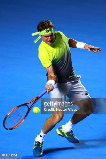 David Ferrer of Spain takes a forehand shot during the match between David Ferrer of Spain and Andrey Rublev of Russia as part of the Telcel Mexican...