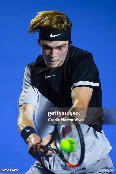 Andrey Rublev of Russia takes a backhand shot during the match between David Ferrer of Spain and Andrey Rublev of Russia as part of the Telcel...