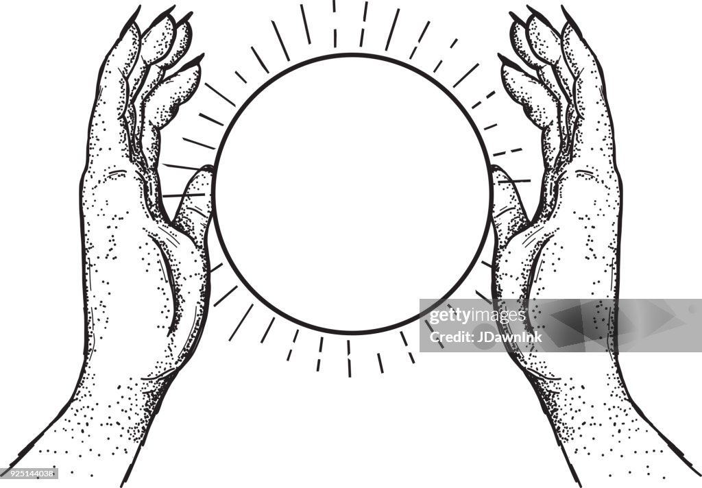 Two hands holding a crystal ball