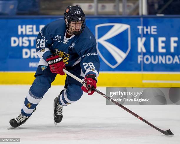 Jesperi Kotkaniemi of the Finland Nationals skates up ice with the puck against the Russian Nationals during the 2018 Under-18 Five Nations...