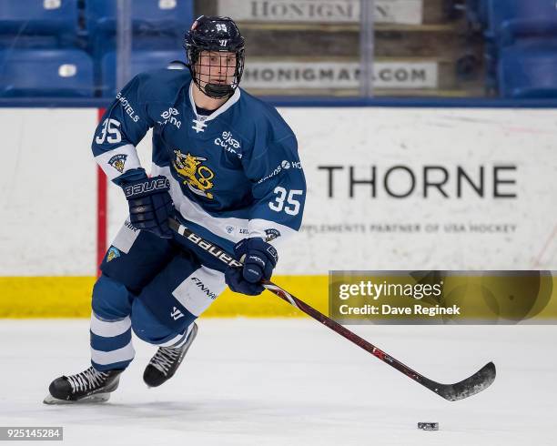 Lenni Killinen of the Finland Nationals turns up ice with the puck against the Russian Nationals during the 2018 Under-18 Five Nations Tournament...