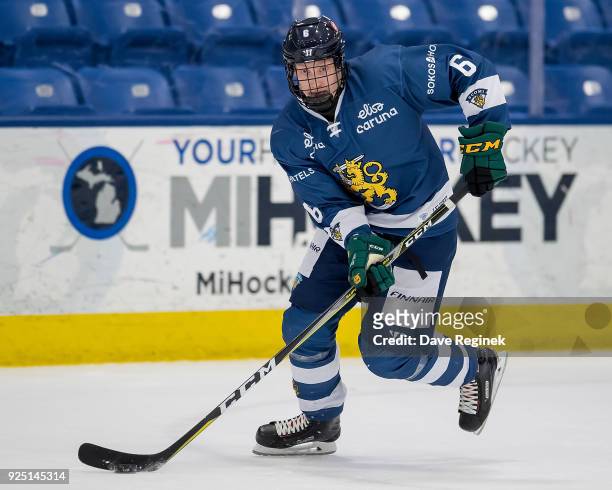 Lassi Thomson of the Finland Nationals skates up ice with the puck against the Russian Nationals during the 2018 Under-18 Five Nations Tournament...