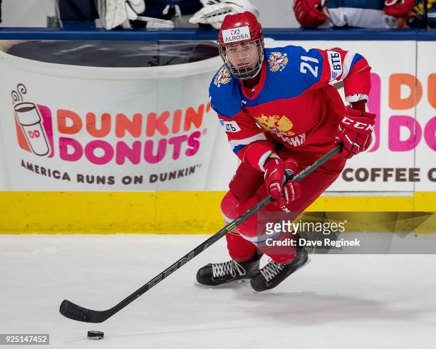 Kirill Marchenko of the Russian Nationals controls the puck against the Finland Nationals during the 2018 Under-18 Five Nations Tournament game at...