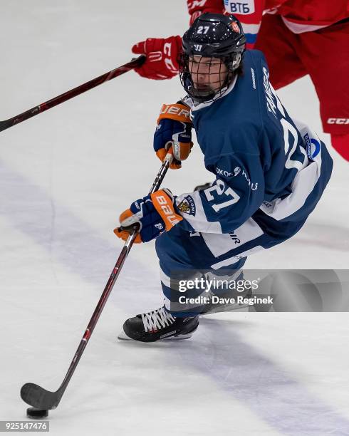 Kristian Tanus of the Finland Nationals skates up ice with the puck against the Russian Nationals during the 2018 Under-18 Five Nations Tournament...