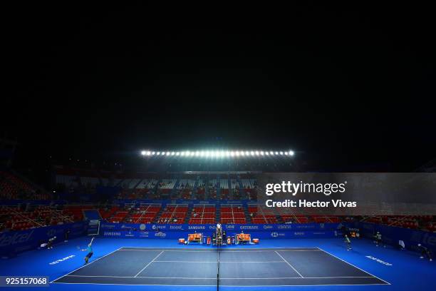 Kevin Anderson of South Africa serves during the match between Radu Albot of Moldova and Kevin Anderson of South Africa as part of the Telcel Mexican...