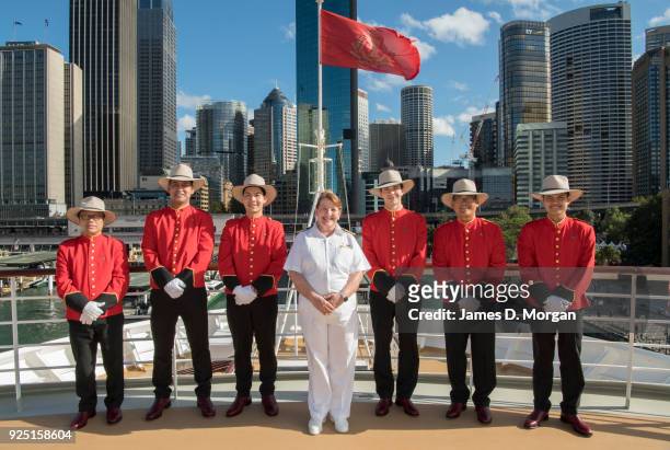 Captain Inger Klein Thorhauge with Cunard's famous Bellboys wearing R.M.Williams boots and Akubra hats on board Queen Elizabeth on February 28, 2018...