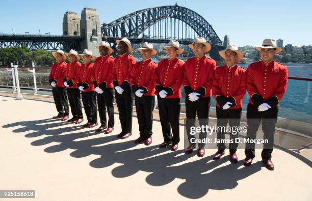 Cunard's famous Bellboys wearing R.M.Williams boots and Akubra hats on the back deck of Queen Elizabeth on February 28, 2018 in Sydney, Australia....