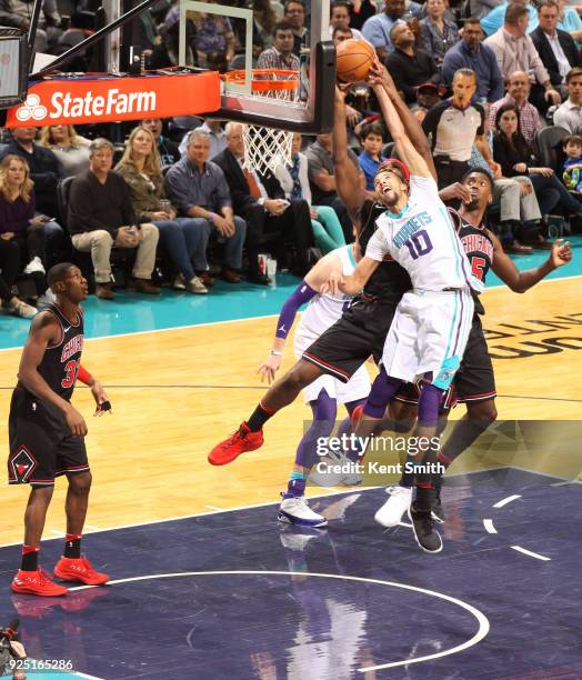 Michael Carter-Williams of the Charlotte Hornets dunks against the Chicago Bulls on February 27, 2018 at Spectrum Center in Charlotte, North...