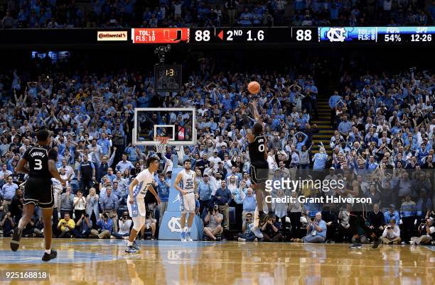 Ja'Quan Newton of the Miami Hurricanes makes the game-winning basket as time expires during their game against the North Carolina Tar Heels at the...