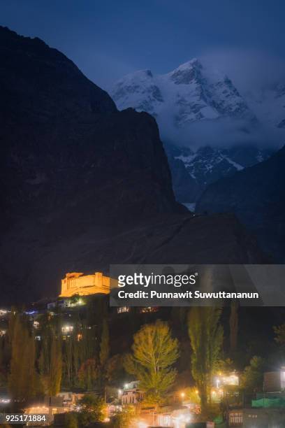 baltit fort at night in hunza valley in autumn season, gilgit baltistan, pakistan - ice fortress stock pictures, royalty-free photos & images