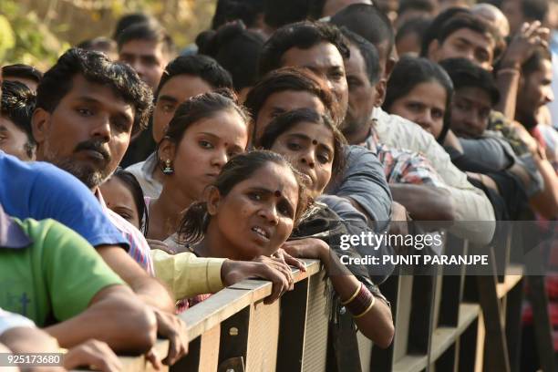 Fans stand in a queue to pay their last respects to late Bollywood actress Sridevi Kapoor before her funeral in Mumbai on February 28, 2018. India...