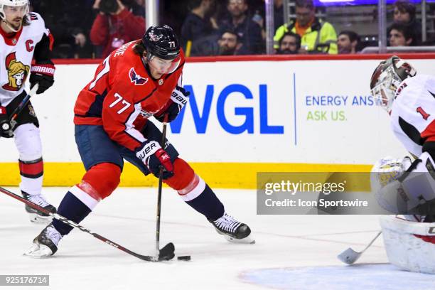 Washington Capitals right wing T.J. Oshie fires a second period shot against Ottawa Senators goaltender Mike Condon on February 27 at the Capital One...