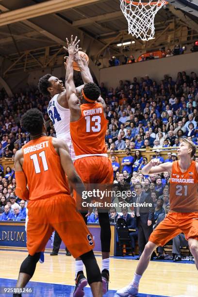 Duke Blue Devils forward Wendell Carter Jr goes to the basket as Syracuse Orange center Paschal Chukwu defends during the men's college basketball...