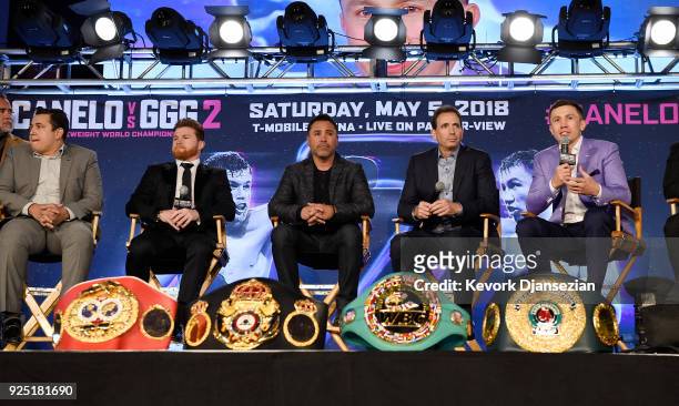 Boxers Canelo Alvarez and Gennady Golovkin take part in a news conference with Eddy Reynoso trainer of Alvarez, Oscar De La Hoya, promoter of...