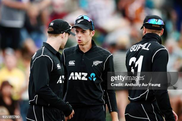 Mitchell Santner of New Zealand chats to teammate Lockie Ferguson ahead of their innings during game two of the One Day International series between...