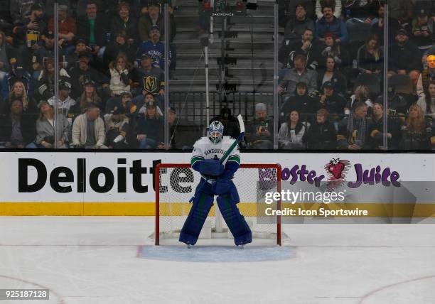 Vancouver Canucks goaltender Anders Nilsson tends the net during the first period of a regular season NHL game between the Vancouver Canucks and the...