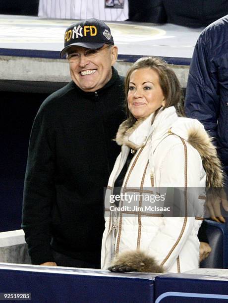 Former mayor Rudy Giuliani and his wife Judith look on during in Game Two of the 2009 MLB World Series at Yankee Stadium on October 29, 2009 in the...
