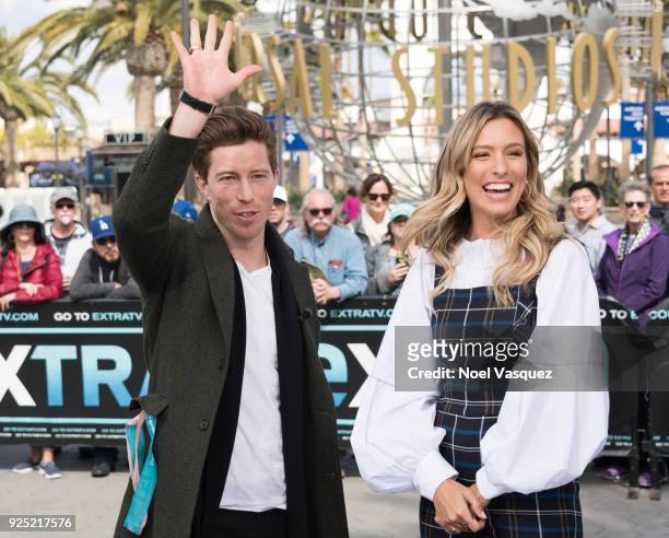 Shaun White and Renee Bargh visit "Extra" at Universal Studios Hollywood on February 27, 2018 in Universal City, California.