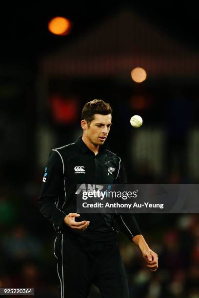 Mitchell Santner of New Zealand looks on during game two of the One Day International series between New Zealand and England at Bay Oval on February...