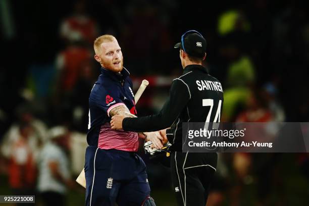 Ben Stokes of England shakes hand with Mitchell Santner of New Zealand after game two of the One Day International series between New Zealand and...