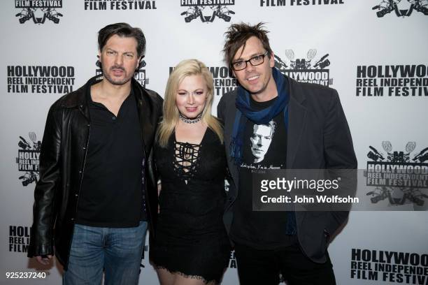 David Hayter, Jessica Cameron and Matthew Currie Holmes arrive at Regal Cinemas L.A. Live on February 27, 2018 in Los Angeles, California.