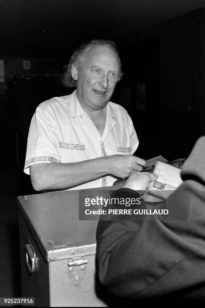 French Trappe's mayor Bernard Hugo takes part, as candidate, to the municipal elections in a polling station on July 3, 1983 at Trappes, near Paris.