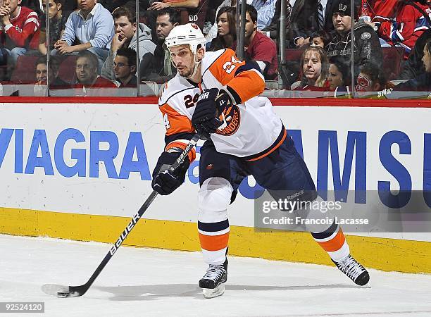 Radek Martinek of the New York Islanders takes a shot during the NHL game against the New York Islanders on October 26, 2009 at the Bell Center in...