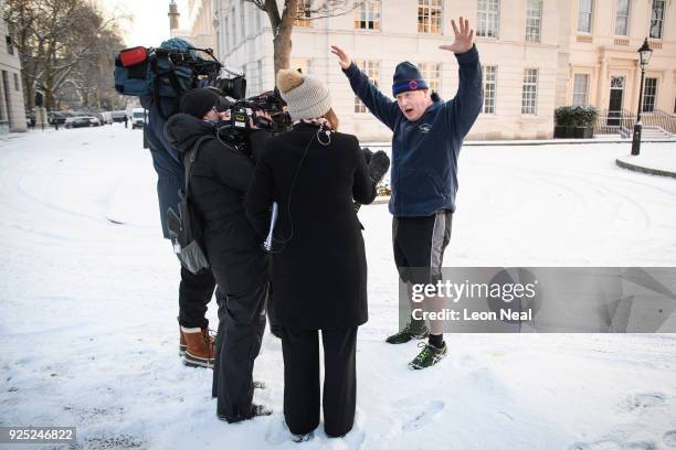 British Foreign Secretary Boris Johnson speaks to the media after jogging through St James Park on February 28, 2018 in London, England. A letter...