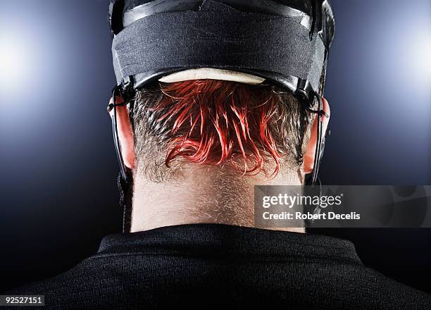 ice hockey player photographed from the rear - ice hockey player back turned stock pictures, royalty-free photos & images